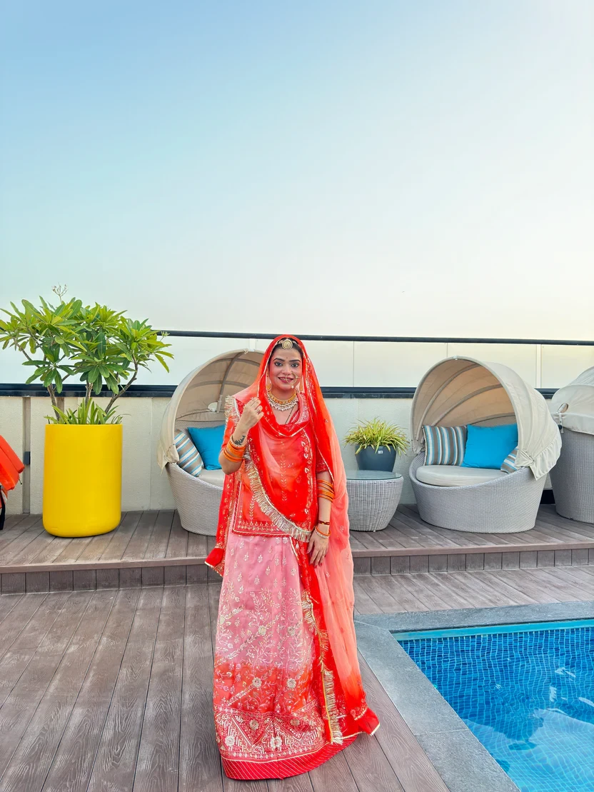 Peach Perfection: Organza Rajputi Poshak with a Whisper of Orange