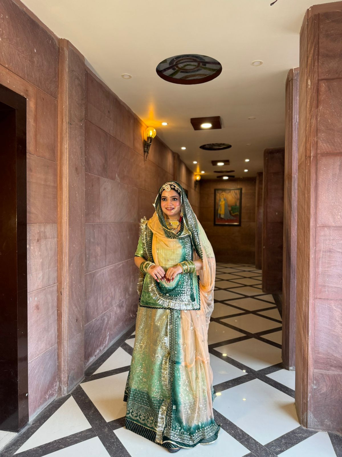 Emerald Enchantment: Verdant Organza Poshak(semi stich)