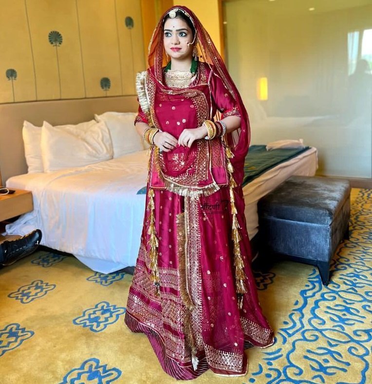 Regal Crimson Elegance: Maroon Satin With Lahriya Boder Poshak(Semi stich)