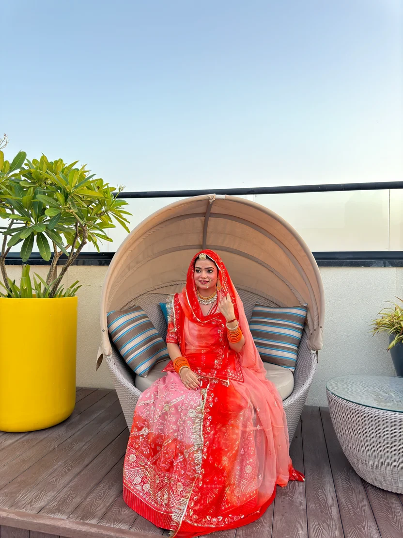 Peach Perfection: Organza Rajputi Poshak with a Whisper of Orange