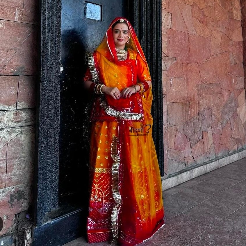 Sunny Radiance: Organza Two-Tone Threadwork Poshak in Orange and Yellow(Semi stich)