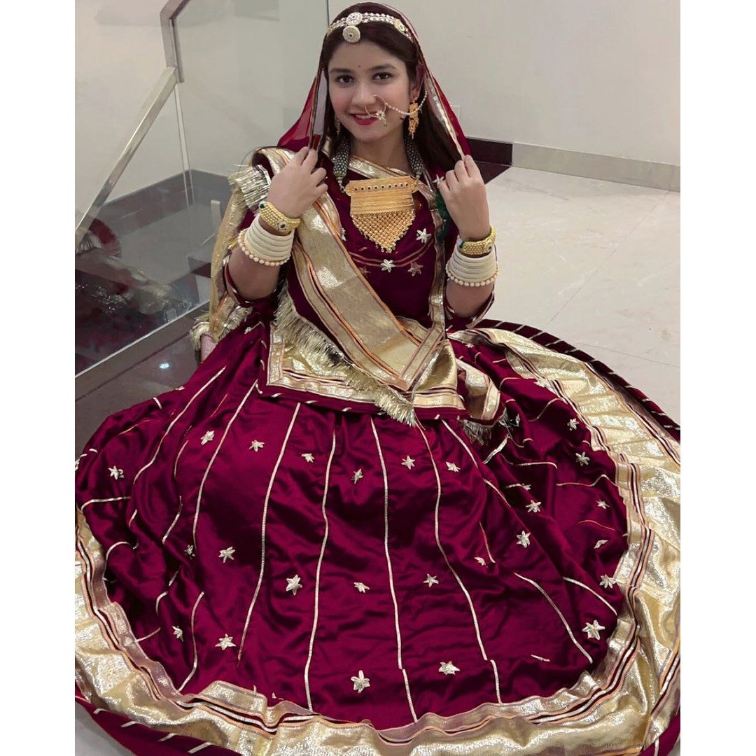 24 Kali Heavy Quality Satin Poshak with Humrahi Pure Odhni in Dark Rani-Colour