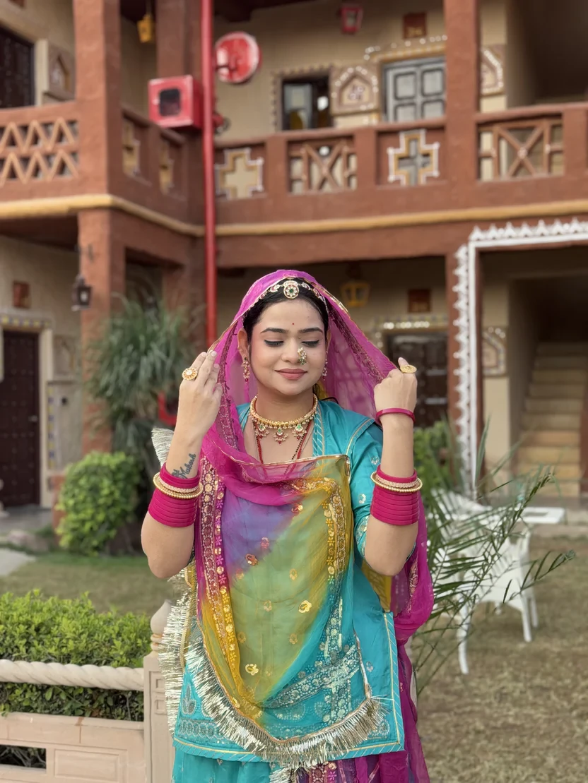 Bindani Grace in Firozi Rajputi Poshak With 5 Colour Odhna